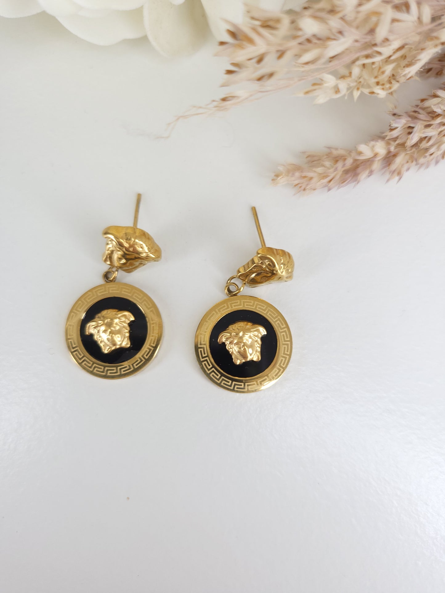 Boucles d'oreilles versus 2