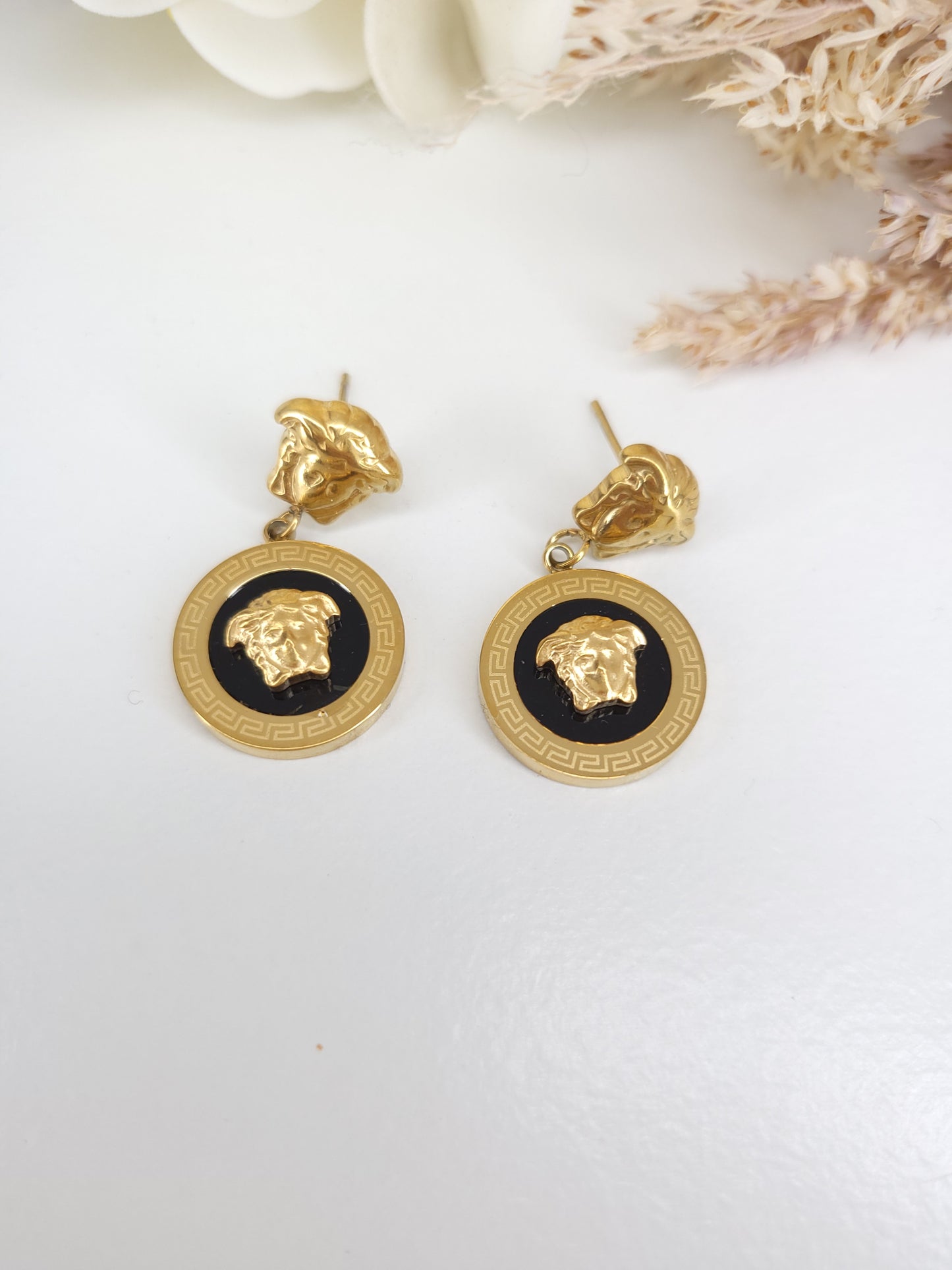 Boucles d'oreilles versus 2