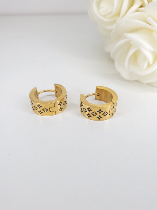 Boucles d'oreilles créoles LV